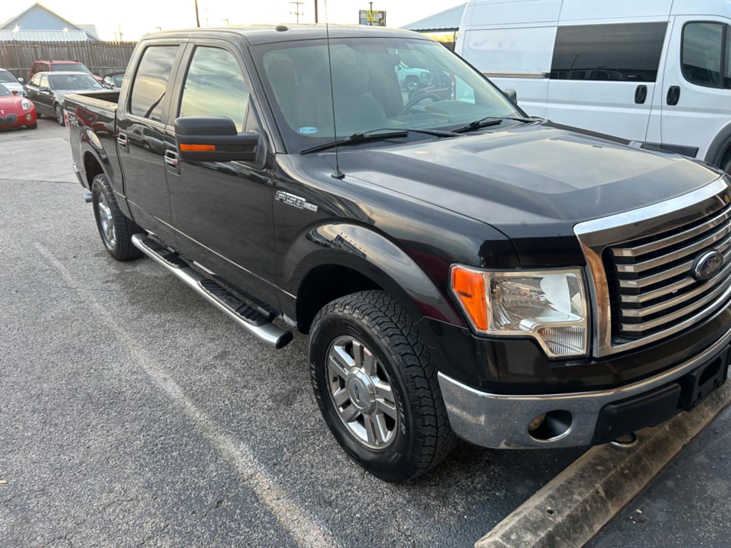 2012 Black Ford F-150 XL SuperCrew 5.5-ft. Bed 4WD (1FTFW1EF1CK) with an 5.0L V8 engine, 6-Speed Automatic transmission, located at 1687 Business 35 S, New Braunfels, TX, 78130, (830) 625-7159, 29.655487, -98.051491 - Photo#1